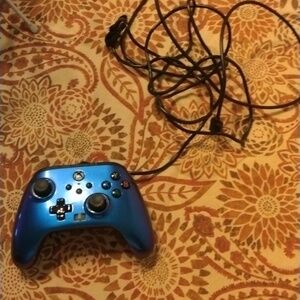 One blue Xbox One controller